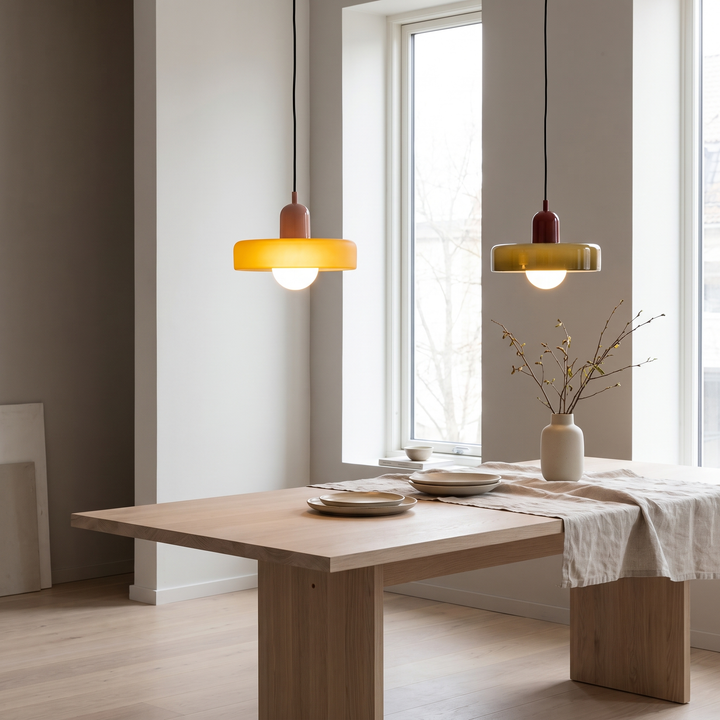 Duet two-tone glass pendant light in a Scandinavian dining room