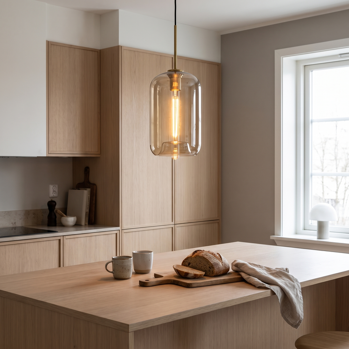Tumbler cognac glass pendant light in a Scandinavian kitchen