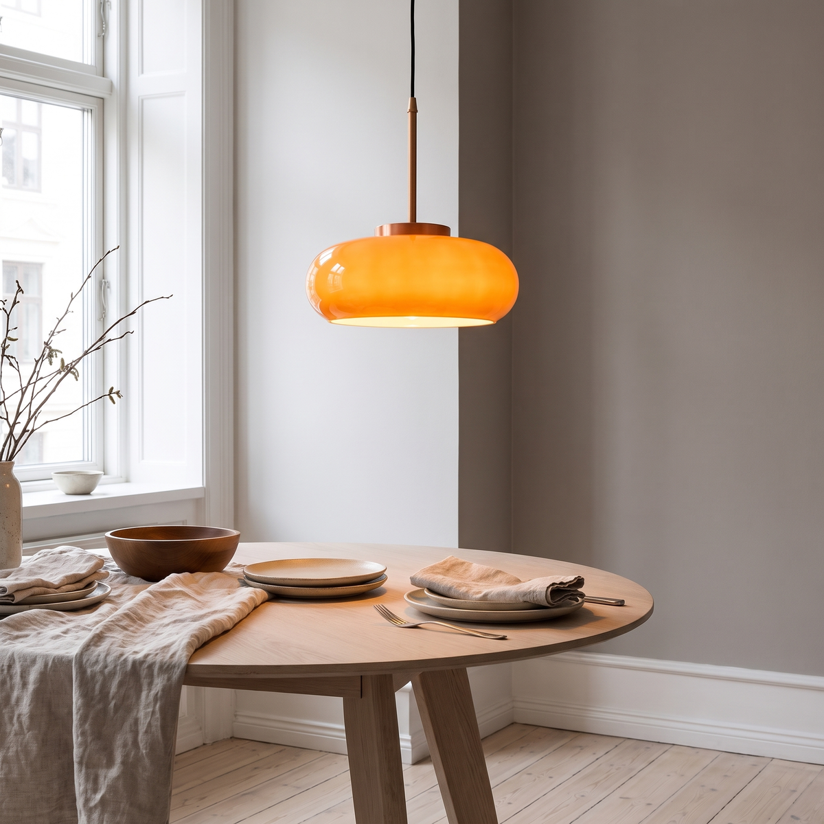 Penny copper pendant light in a Scandinavian dining room