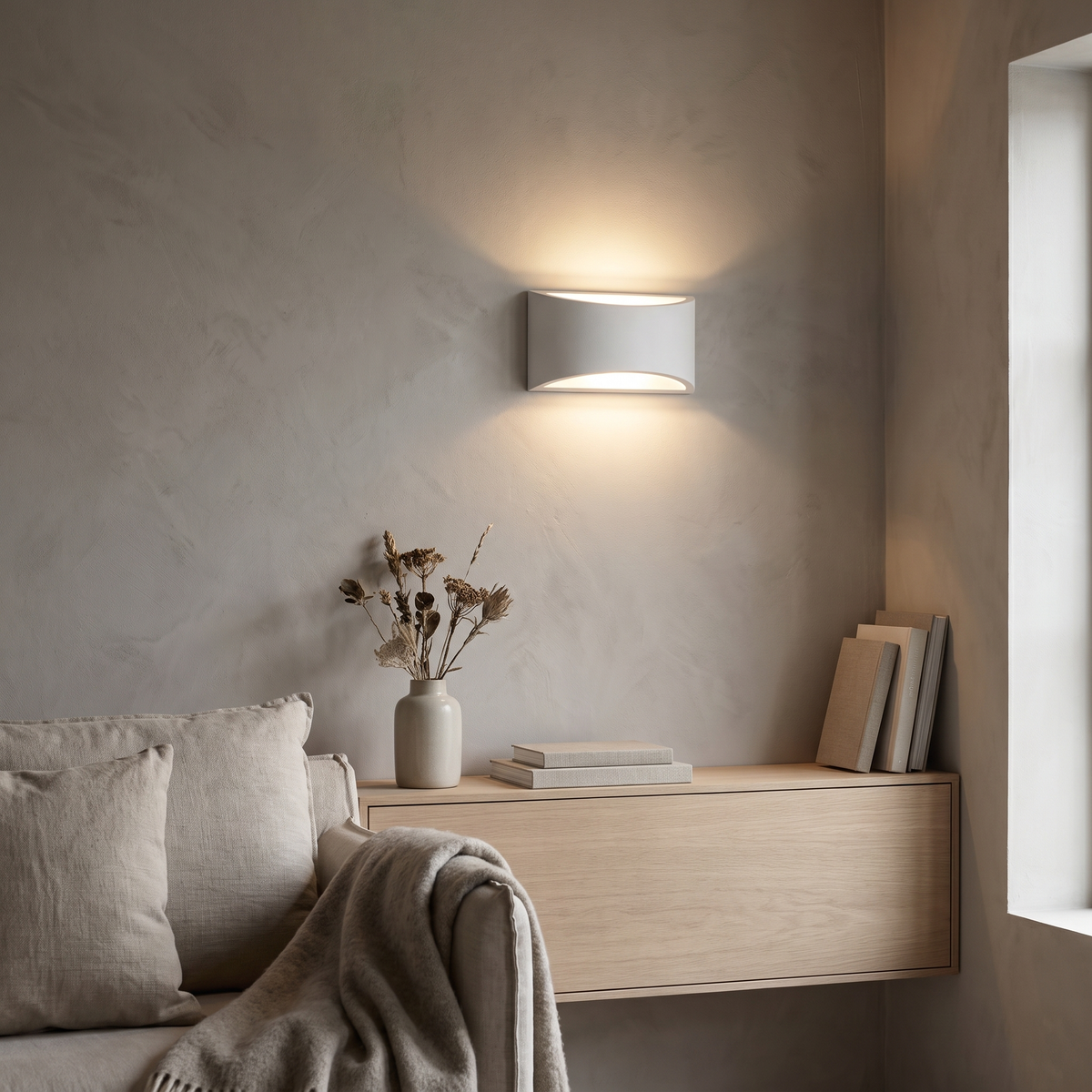 Alabaster plaster wall sconce in a Scandinavian interior