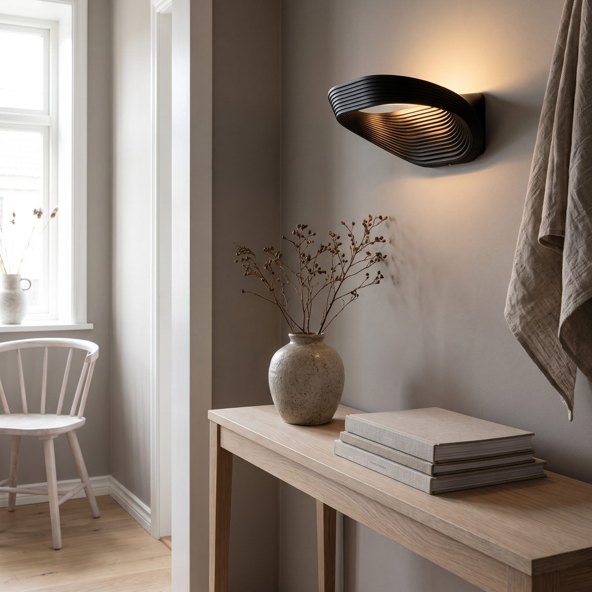Fold minimalist wall sconce in a Scandinavian interior