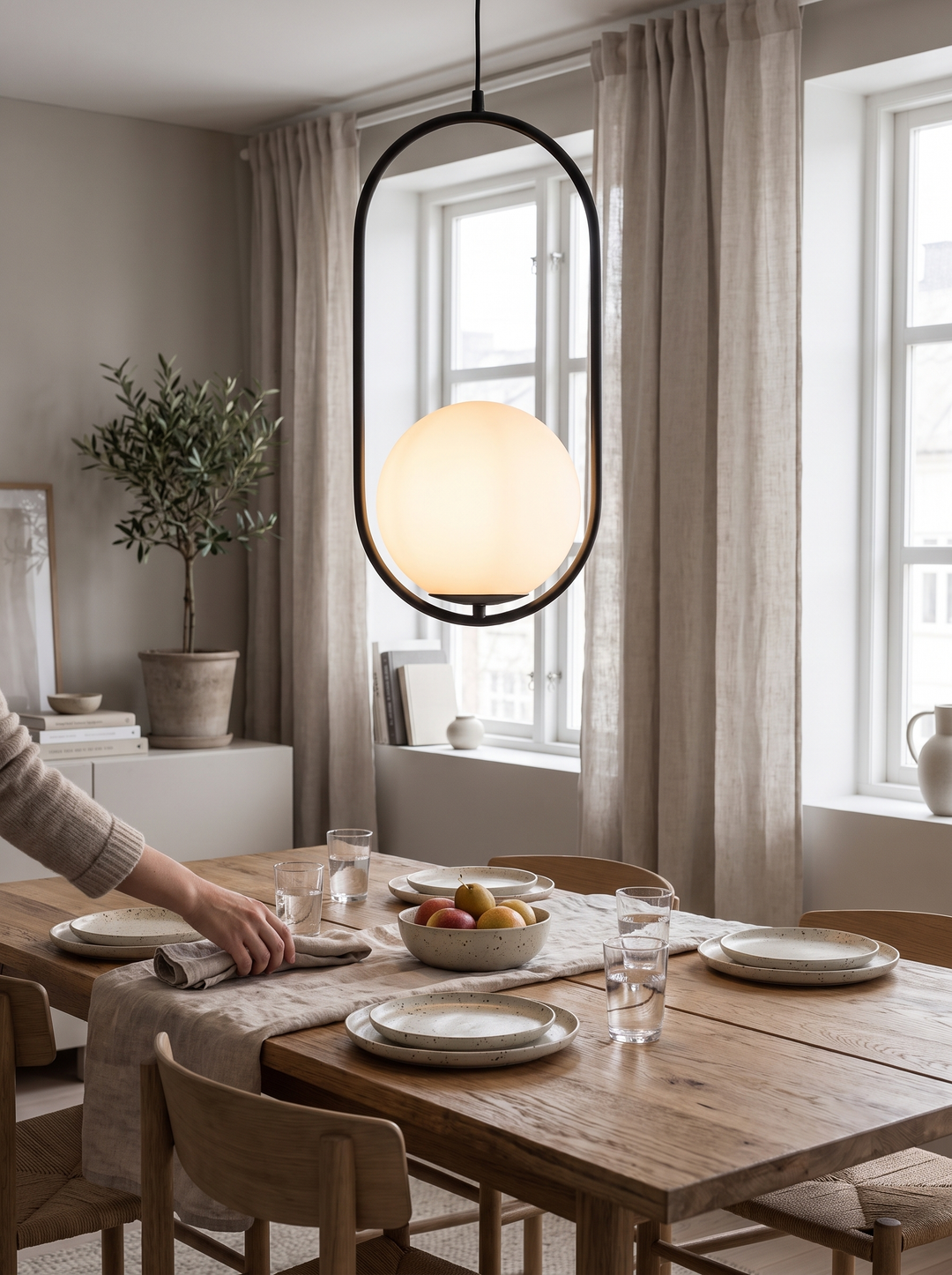 Lumenorth Vessel Glass Pendant Light in its slim metal frame