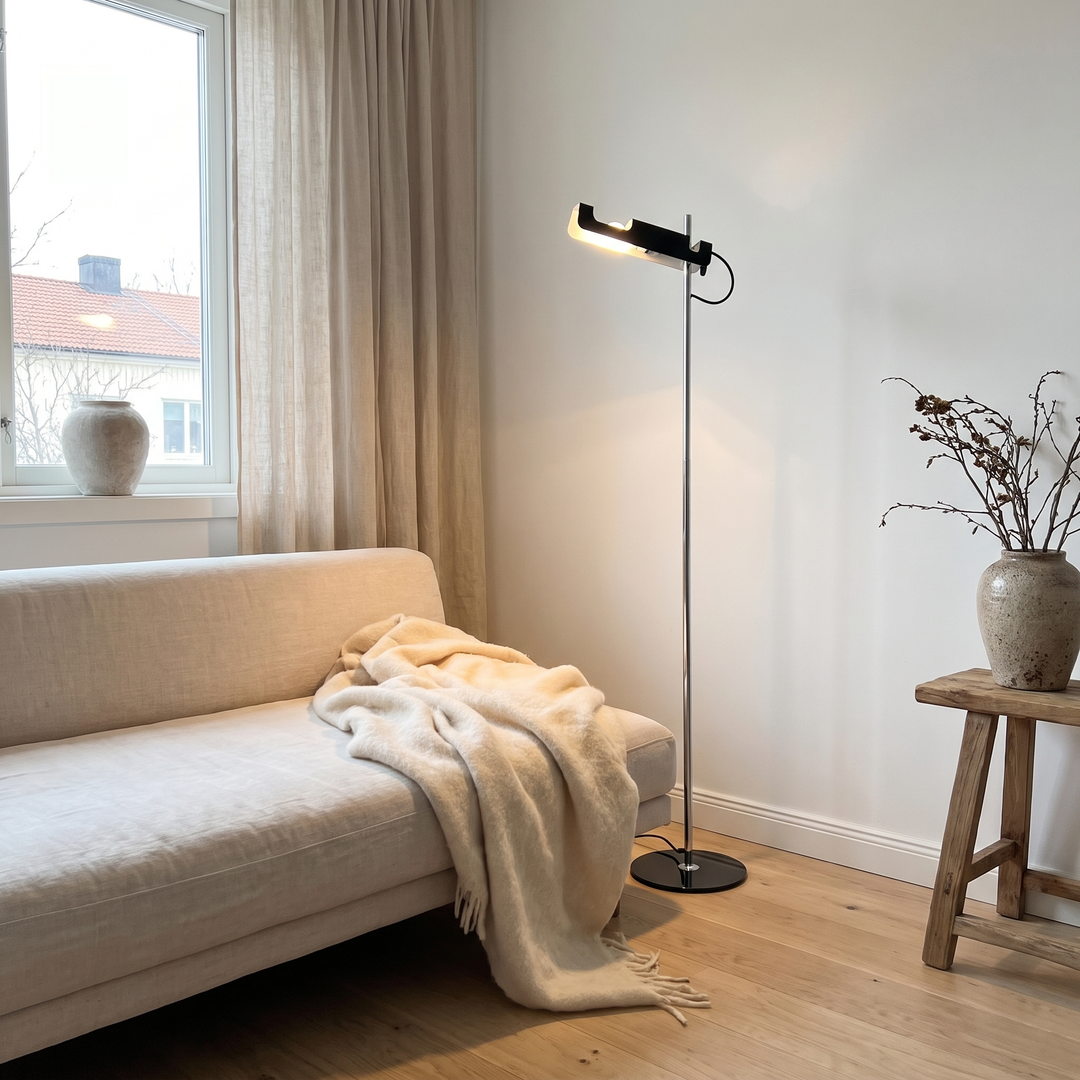 Pivot floor lamp beside a linen sofa in a Scandinavian living room