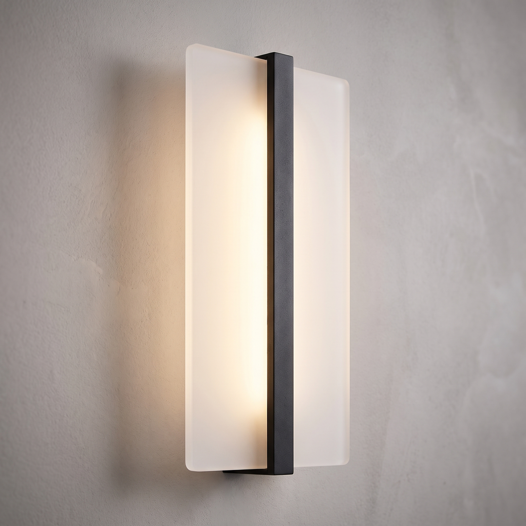 Close-up of the Pulse wall light showing the frosted panel and slim black centre bar
